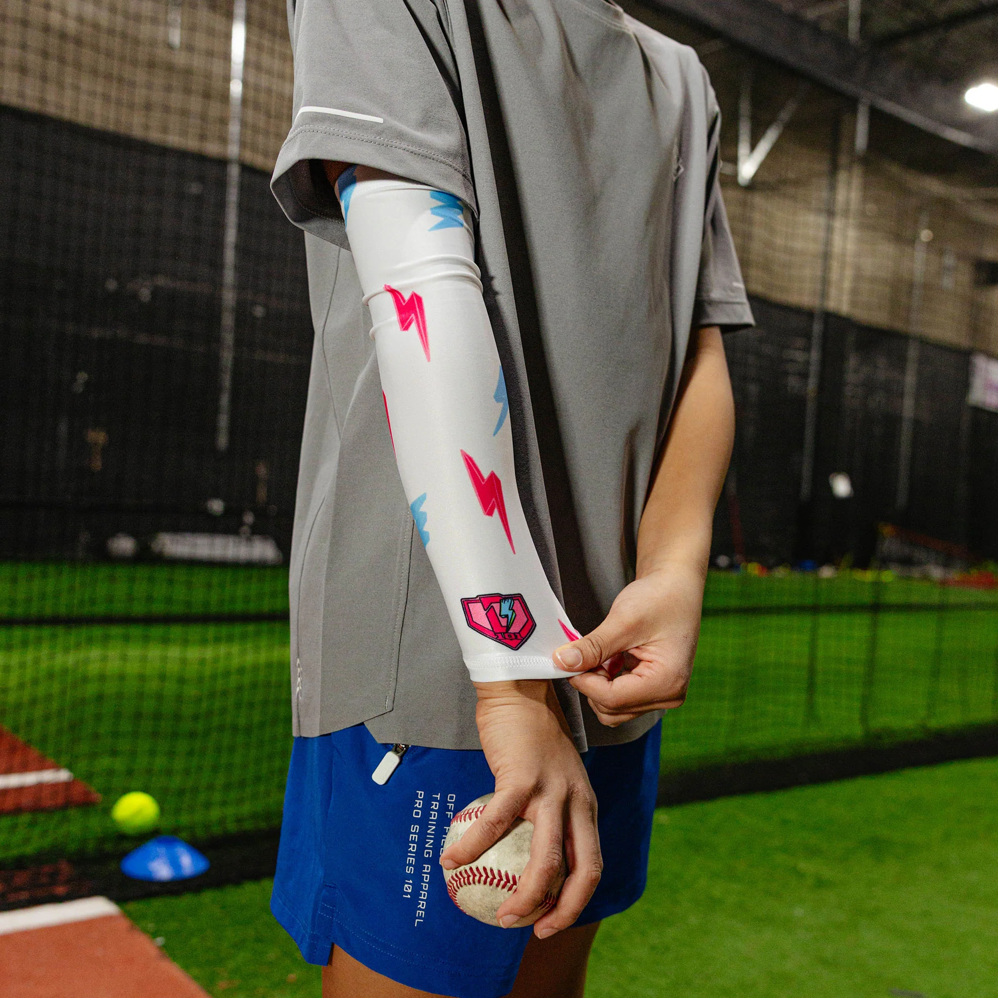 Rain Delay Lightning Youth Arm Sleeve - White/Pink/Blue - Image 4